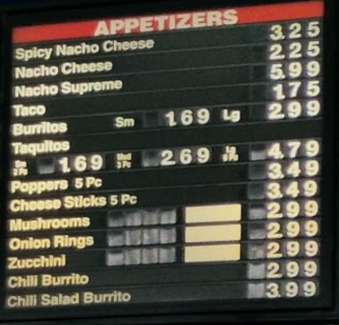 Burger and shake meal on a tray.
